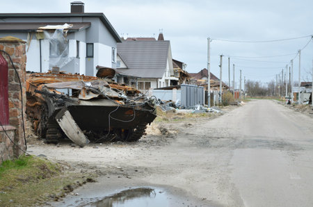 Dmytrivka village, Kyev region, Ukraine - April 13, 2022: Destroyed infantry fighting vehicle of the Russian army following the Ukrainian forces counter-attacks. War of Russia against Ukraine.のeditorial素材