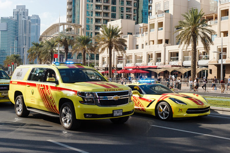 Dubai, UAE - November 28, 2015: Fire and Rescue cars. Parade celebrate 44th anniversary National Day United Arab Emirates. Mohammed Bin Rashid Boulevard, Dubai Downtown.のeditorial素材