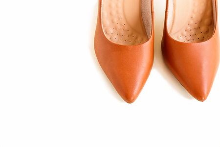 Mock up Pair of classic women brown leather heels. Fashion footwear. Isolated. White background. Top view. Copy space.の写真素材