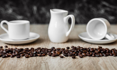 Espresso in a white cup, coffee beans, coffee