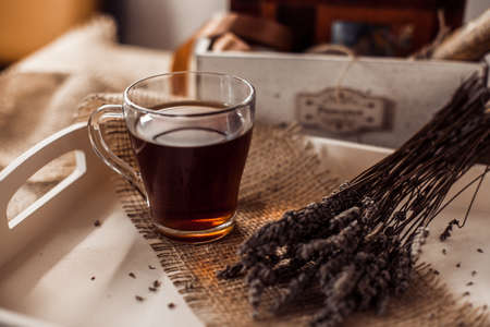 tea cup on wooden tray, lavender, wooden boxの写真素材
