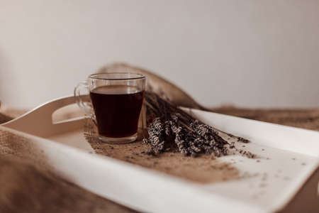 tea cup on wooden tray, lavender, wooden boxの写真素材