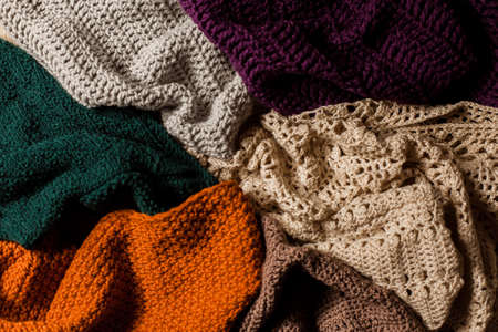 Knitted things. Tangles, knitting needles, and a hook. Background and place for the text.の写真素材