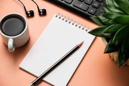 Office desk table with computer, supplies and coffee cup. top view with copy spaceの写真素材