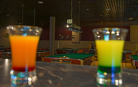 set of cocktails are on the bar, beautiful wine glasses with different content