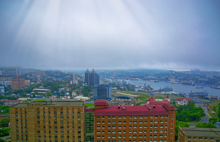 port city view from the heights, high Bay braced bridge, thick fog. Marine City. Vladivostokの写真素材