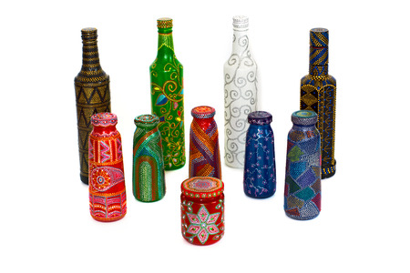 many different bottles, painted dot painted on isolated background. Creative painting.の写真素材