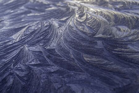 Beautiful frosty pattern an equal surface in winter morning. の写真素材
