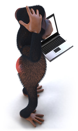 3D chimpanzee with a laptopの写真素材