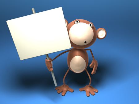 Cartoon monkey holding a placardの写真素材