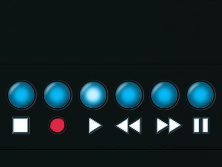 Media player buttons on a black metal surfaceの写真素材