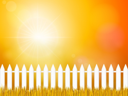 Wooden fence and autumn grass under sky.のイラスト素材