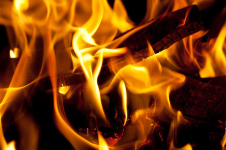 Hot burning fire on black.