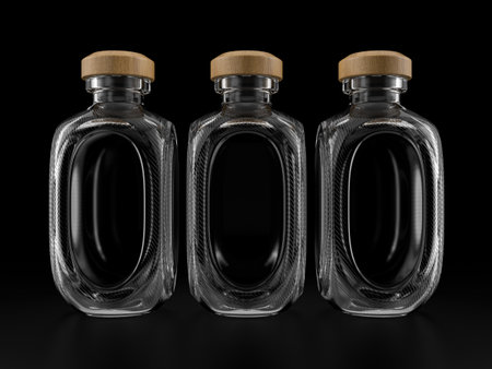 Glass bottles on a black background. 3d illustration.の写真素材