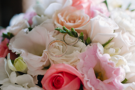 Beautiful engagement rings and bridal bouquet. Wedding bouquetの写真素材
