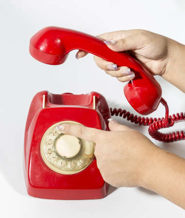 is a hand making a call a hotline oldの写真素材