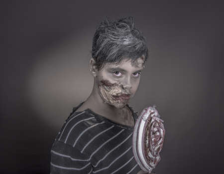 is a girl disguised as a zombieの写真素材