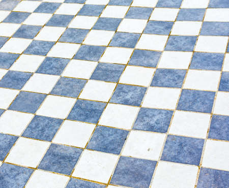 is a tile floor that looks like a chess boardの写真素材