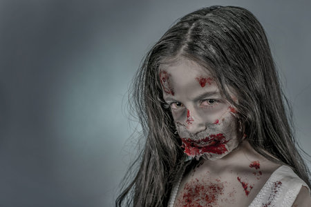 is a zombie girl dressed in a nightgownの写真素材