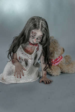 is a zombie girl dressed in a nightgownの写真素材
