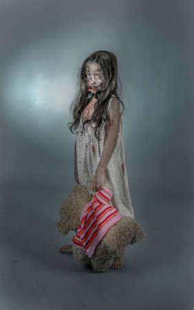 is a zombie girl dressed in a nightgownの写真素材