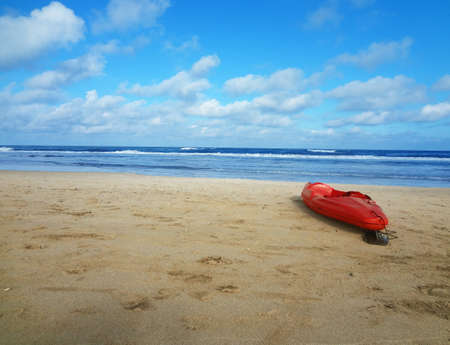 Kayak on the beachの写真素材