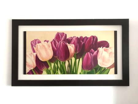Photo of a painted picture of purple and pink tulips with a black frameの写真素材