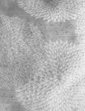 Fabric texture patterned with white flowersの写真素材