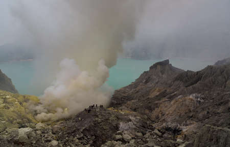 green lake at Kawah Ijen in Indonesiaの写真素材