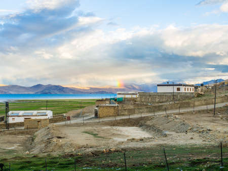 Tso Moriri Lake near Karzok Village with beautiful mountain and rainbowの写真素材