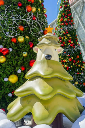 Bangkok, Thailand : December 3, 2017  Christmas Decoration with Christmas Tree, Santa Claus Sculpture, Reindeer and other cartoon characters in front of Central World Shopping Centerのeditorial素材