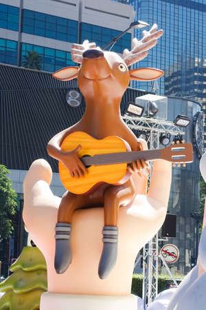 Bangkok, Thailand : December 3, 2017  Christmas Decoration with Christmas Tree, Santa Claus Sculpture, Reindeer and other cartoon characters in front of Central World Shopping Centerのeditorial素材