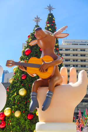 Bangkok, Thailand : December 3, 2017  Christmas Decoration with Christmas Tree, Santa Claus Sculpture, Reindeer and other cartoon characters in front of Central World Shopping Centerのeditorial素材