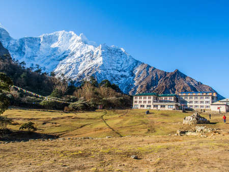 Small village in Nepal with snow capped mountain backgroundのeditorial素材