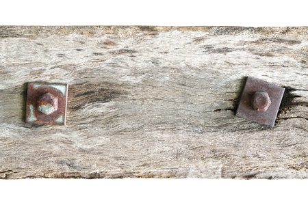Old plank with rusty bolt isolated white backgroundの写真素材