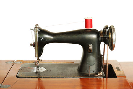 Vintage sewing machine isolated on white background