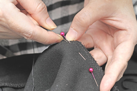 Hands sewing