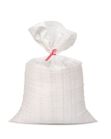 White canvas sack with full paddy isolated on white backgroundの写真素材