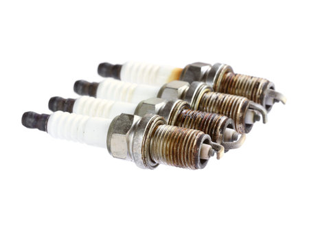 Used spark plug isolated on white background