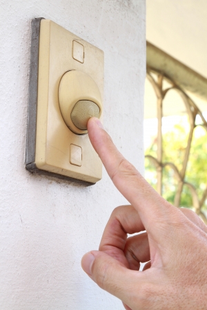 Finger pressing bell switch buttonの写真素材