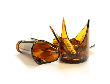 Broken bottle isolated on white backgroundの写真素材