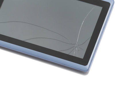 Tablet pc with broken screen isolated on white background