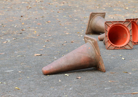 Colorless traffic cone on the roadの写真素材