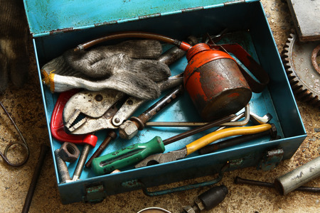Still life with old tools in metal boxの写真素材