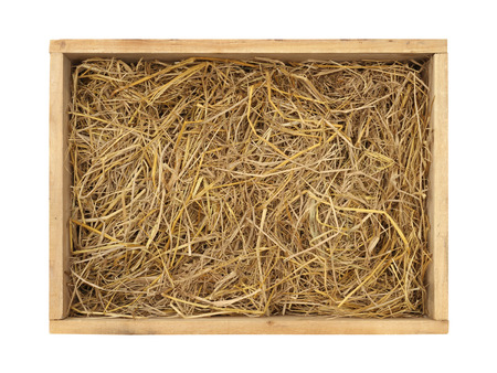 Wooden box with straw (with clipping path) isolated on white backgroundの写真素材