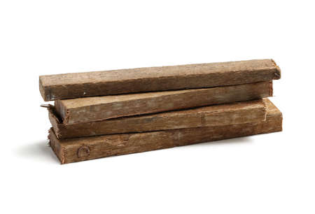Pile of wood scrap  isolated on white backgroundの写真素材