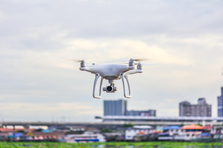 White Drone fly, take off to the airの写真素材