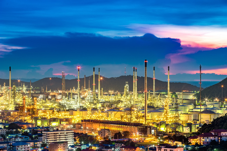 The refinery is located in one of the city during the sunset behind the hills to the sea, a beautiful pictures can be made into a background image of engineering. Thai Oil, Thaioil.の写真素材