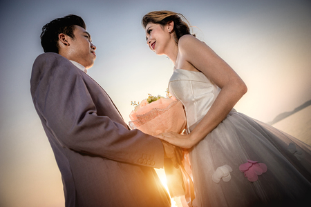 Asian bride and groom to be married on Valentine's Day.の写真素材