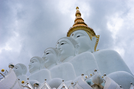A cloudy photo of Five buddhas statue at Wat Phra Thad Pha Son Kaew Temple. Khao-kho, Phetchaboon Distict, Thailand.の写真素材